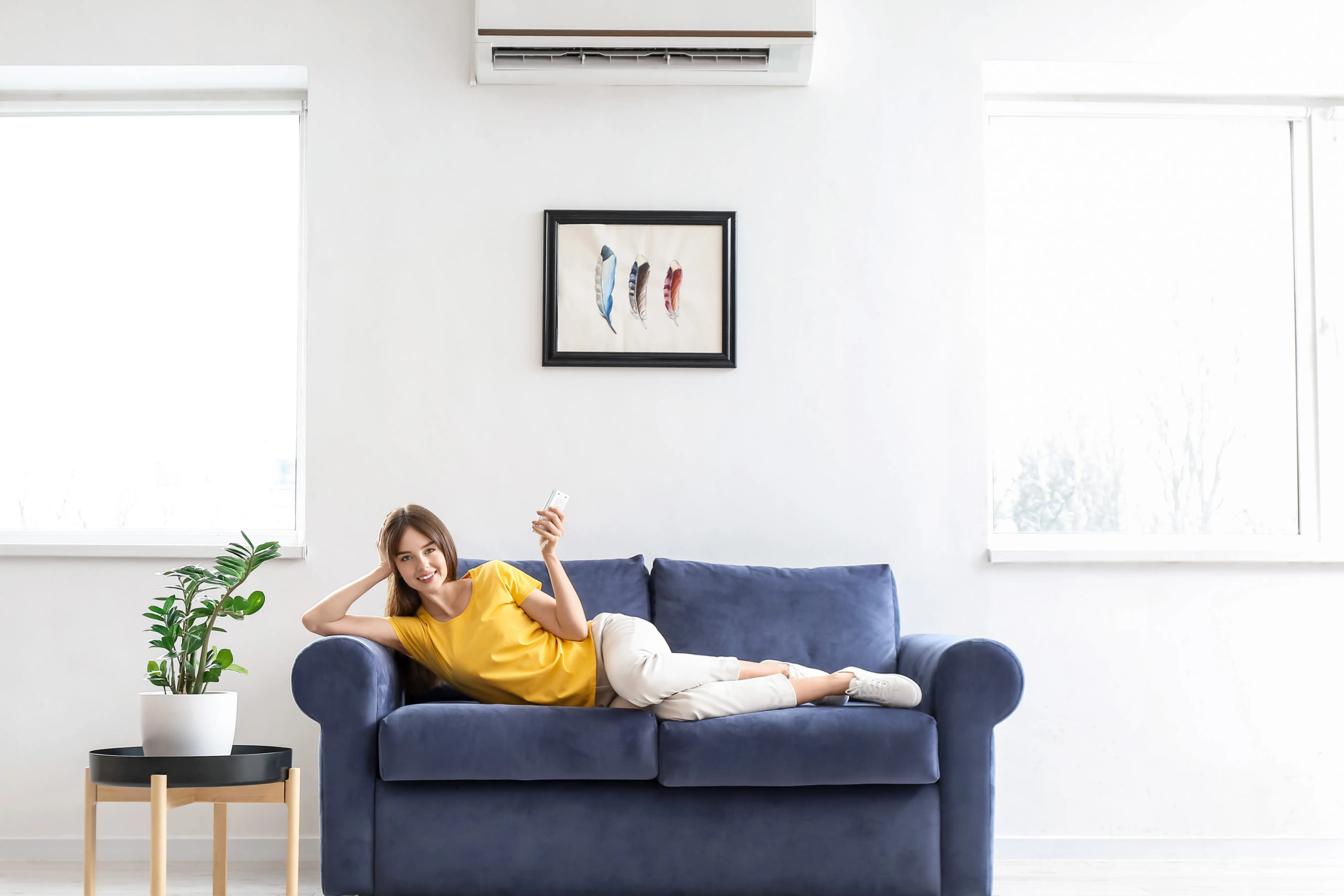 Female relaxing with the AC on