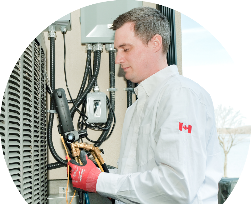 Shines technician servicing an outdoor air conditioner using a digital refrigerant tool, wearing red gloves and a white uniform. Shines technician servicing an outdoor air conditioner using a digital refrigerant tool, wearing red gloves and a white uniform.